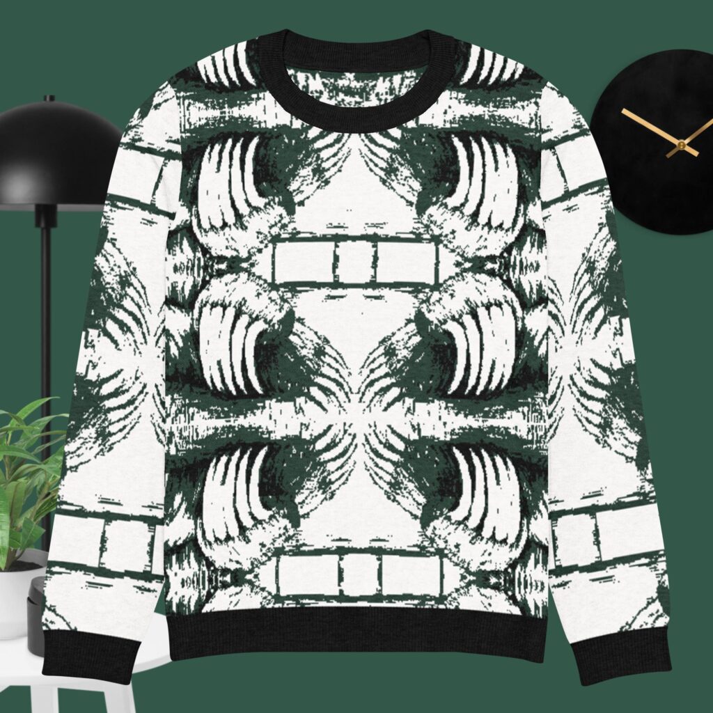 White and Black Bear claws strike a pattern across the knitted sweater. Hints of Pine Green accent the background of the Bear Claw Sweater print.