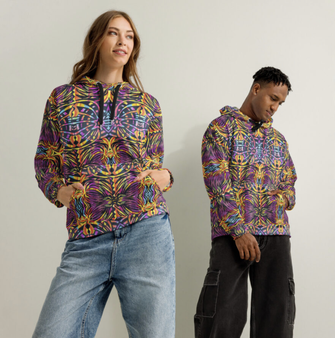 Soft cotton hoodie featuring bold BoomBoom wearable art design, relaxed fit, and cozy style.