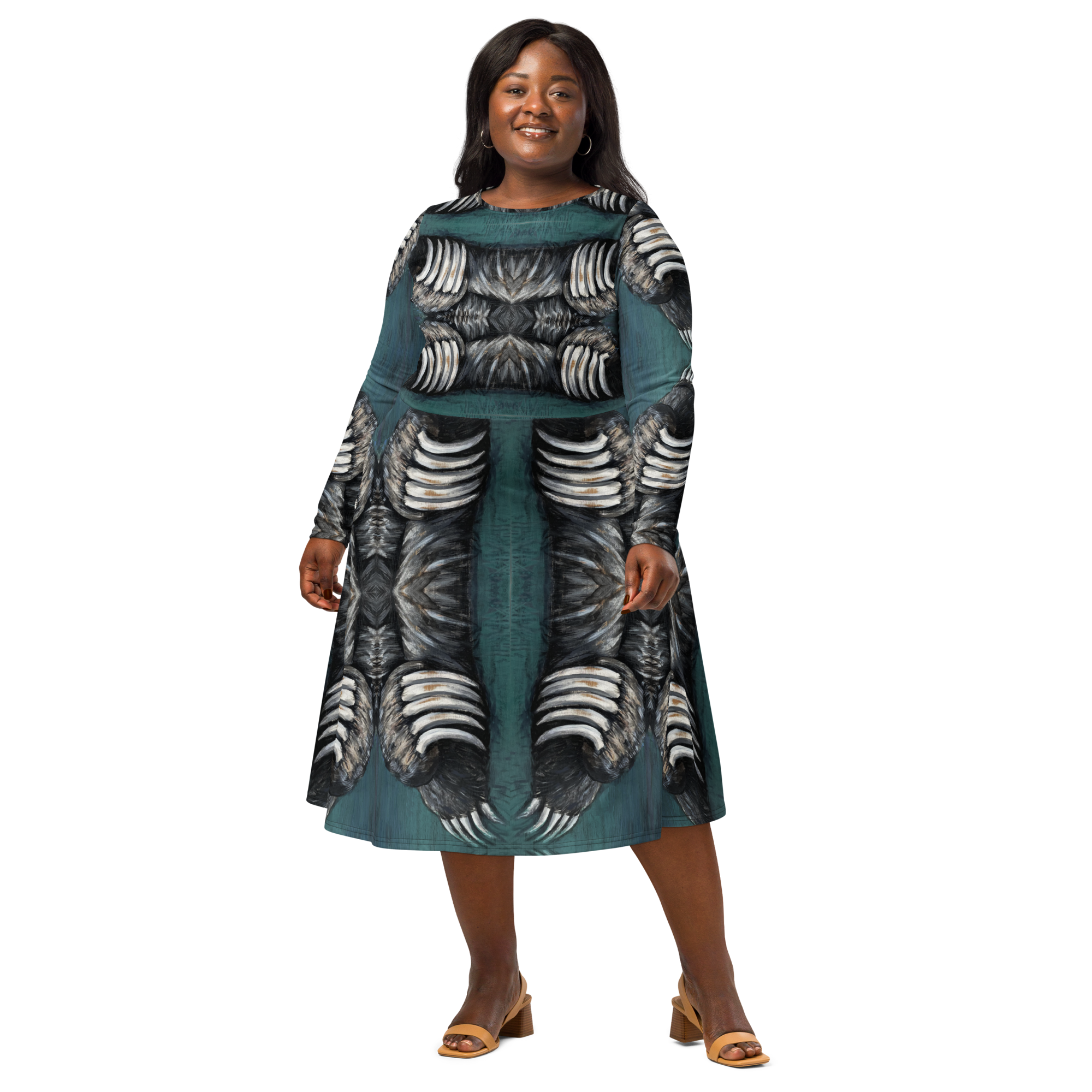 Woman model wearing a plus slize midi dress with a multicolor bear‑claw graphic, with defining texture for silhouetting and 360 degrees wearable art..