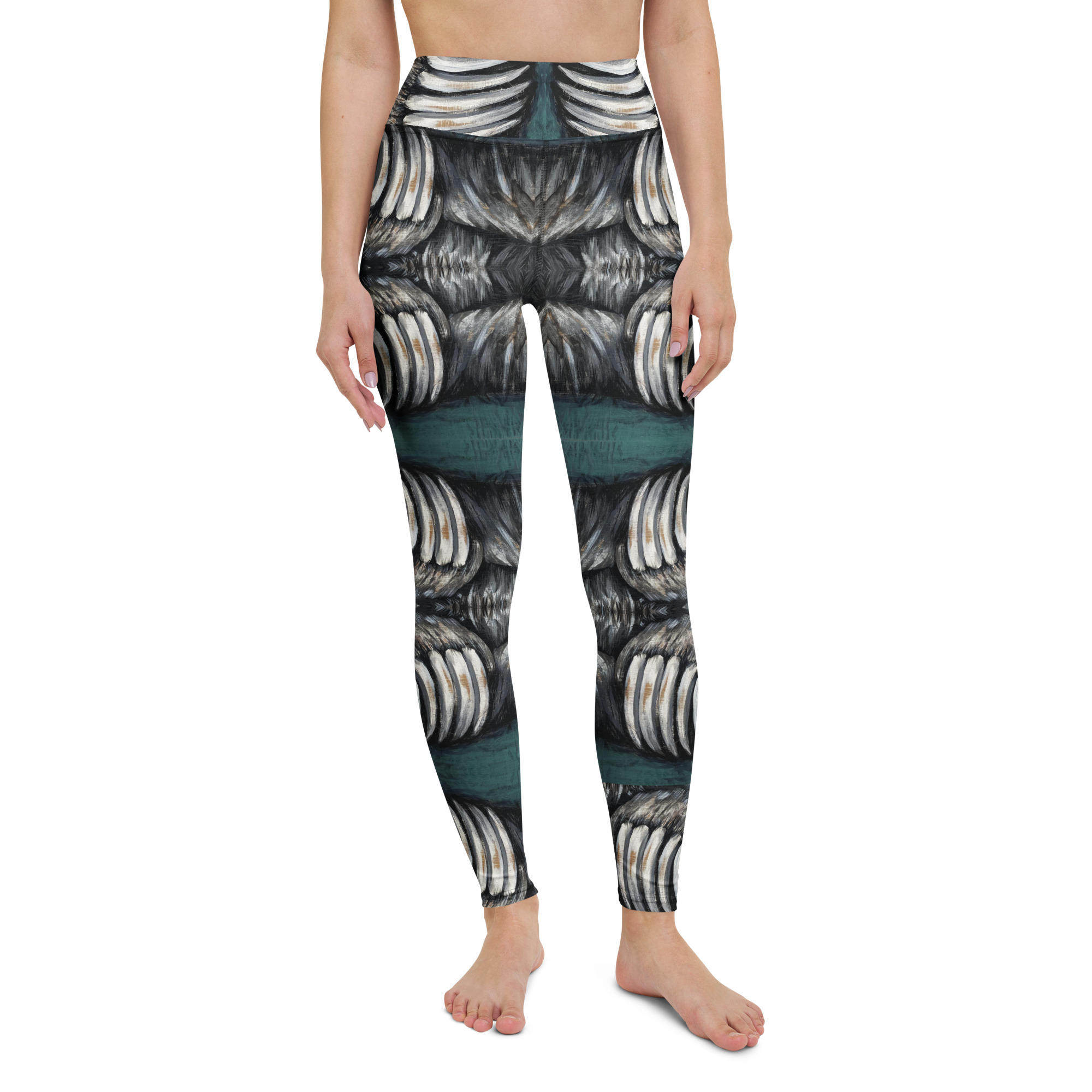 A woman in high waist with a wide waist band yoga leggings. White and black bear claws on a deep green background create a mirror pattern with 360 degrees of fashion designed by Tanya Tee Art_TLC.